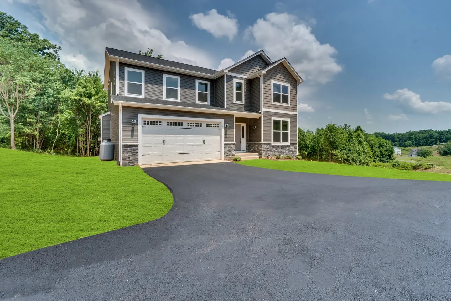 A completed CORELOT home — The Amelia II, two-story with attached garage